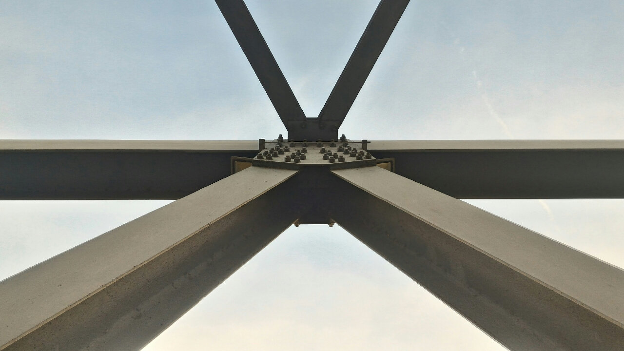 a down view of steel structural beams that were fabricated